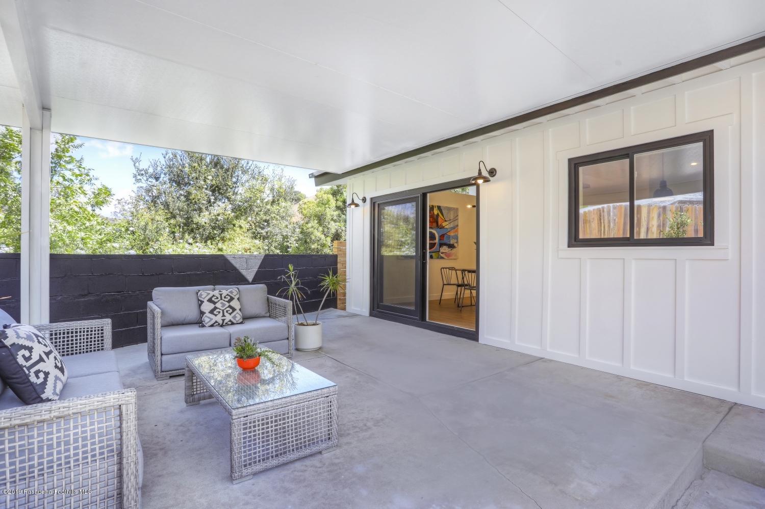 4817 Lockhaven Avenue Los Angeles, CA 90041 - Photo 28 of 34 a living room with furniture and a large window