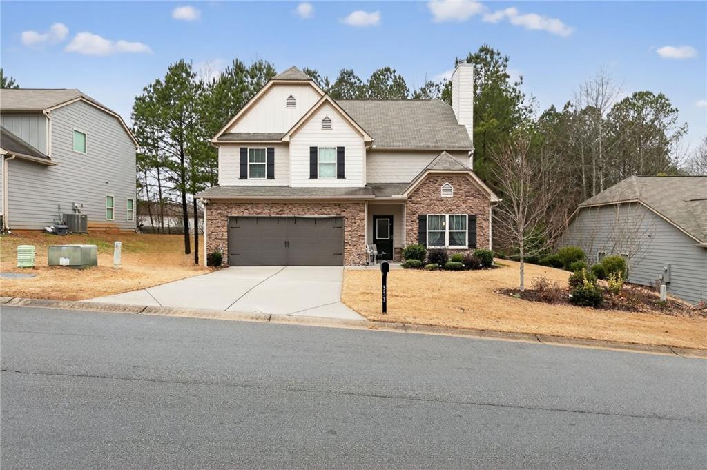 353 Daffodil Drive Temple, GA 30179 - Photo 1 of 30 a front view of a house with a yard