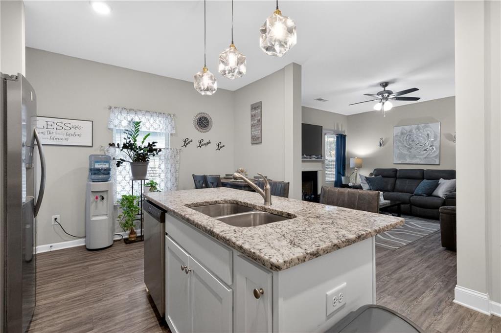 353 Daffodil Drive Temple, GA 30179 - Photo 13 of 30 a kitchen with sink and refrigerator
