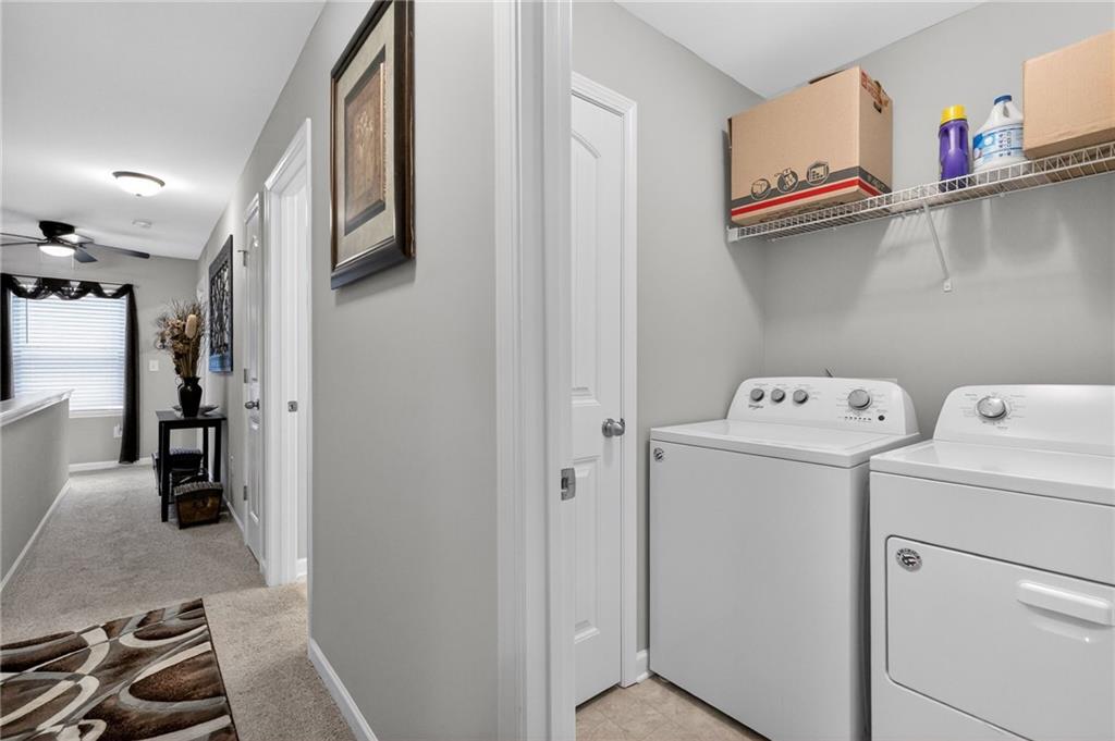 353 Daffodil Drive Temple, GA 30179 - Photo 25 of 30 a view of storage and utility room with washer and dryer