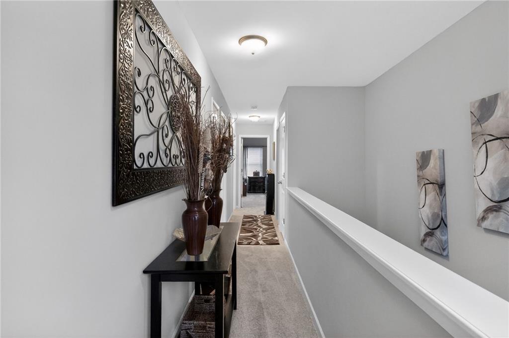 353 Daffodil Drive Temple, GA 30179 - Photo 26 of 30 a view of a hallway with workspace