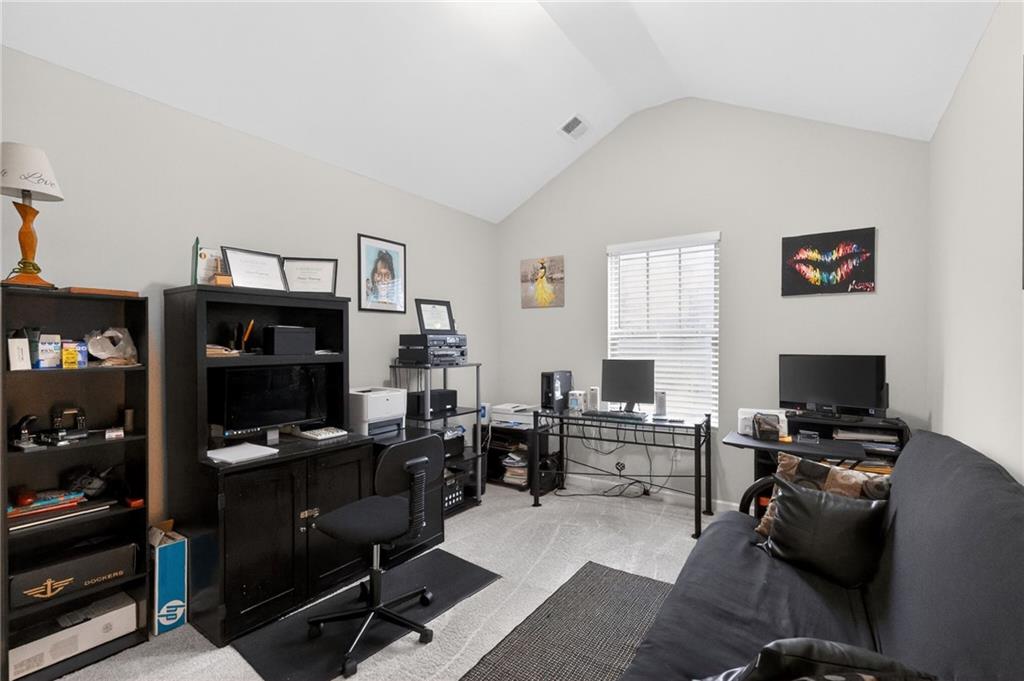 353 Daffodil Drive Temple, GA 30179 - Photo 27 of 30 a view of a livingroom with workspace and a window