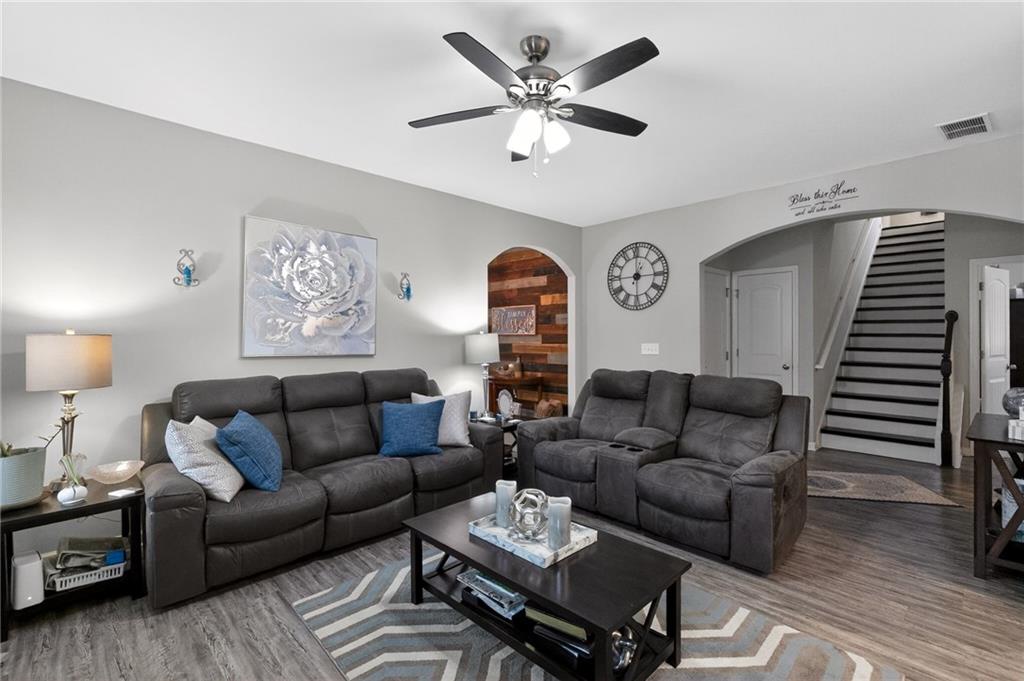 353 Daffodil Drive Temple, GA 30179 - Photo 8 of 30 a living room with furniture and wooden floor