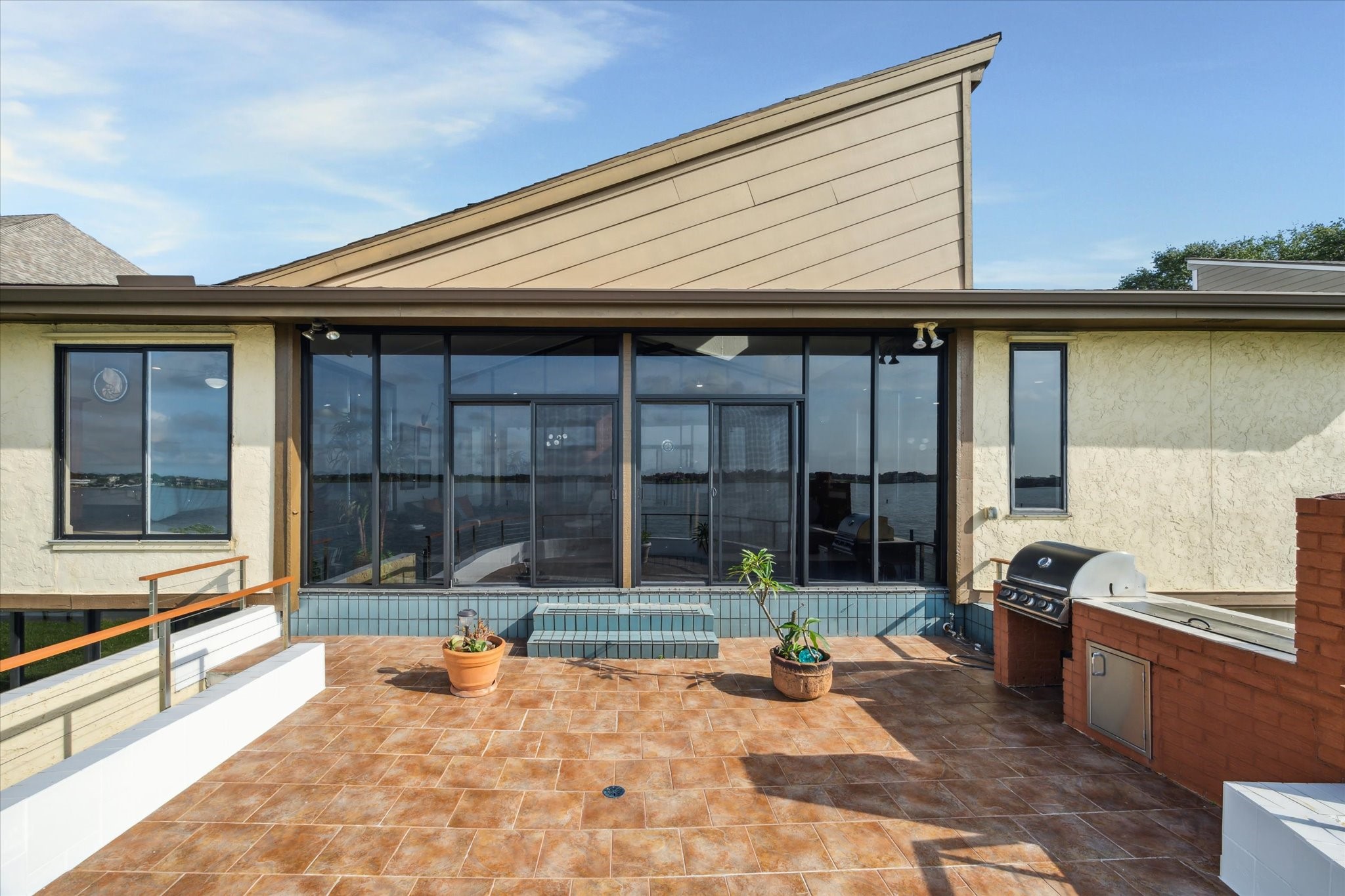 2414 Baycrest Drive Houston, TX 77058 - Photo 17 of 48 a front view of a house with a patio