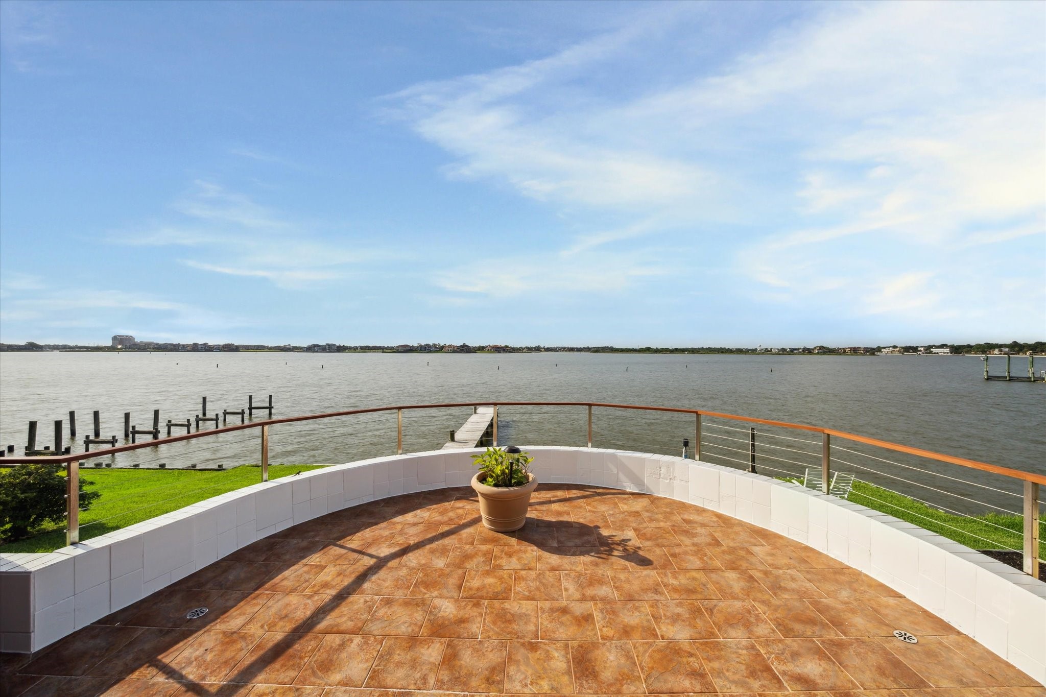 2414 Baycrest Drive Houston, TX 77058 - Photo 2 of 48 a view of a lake with couches in the patio