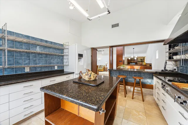 a view of a workspace with furniture