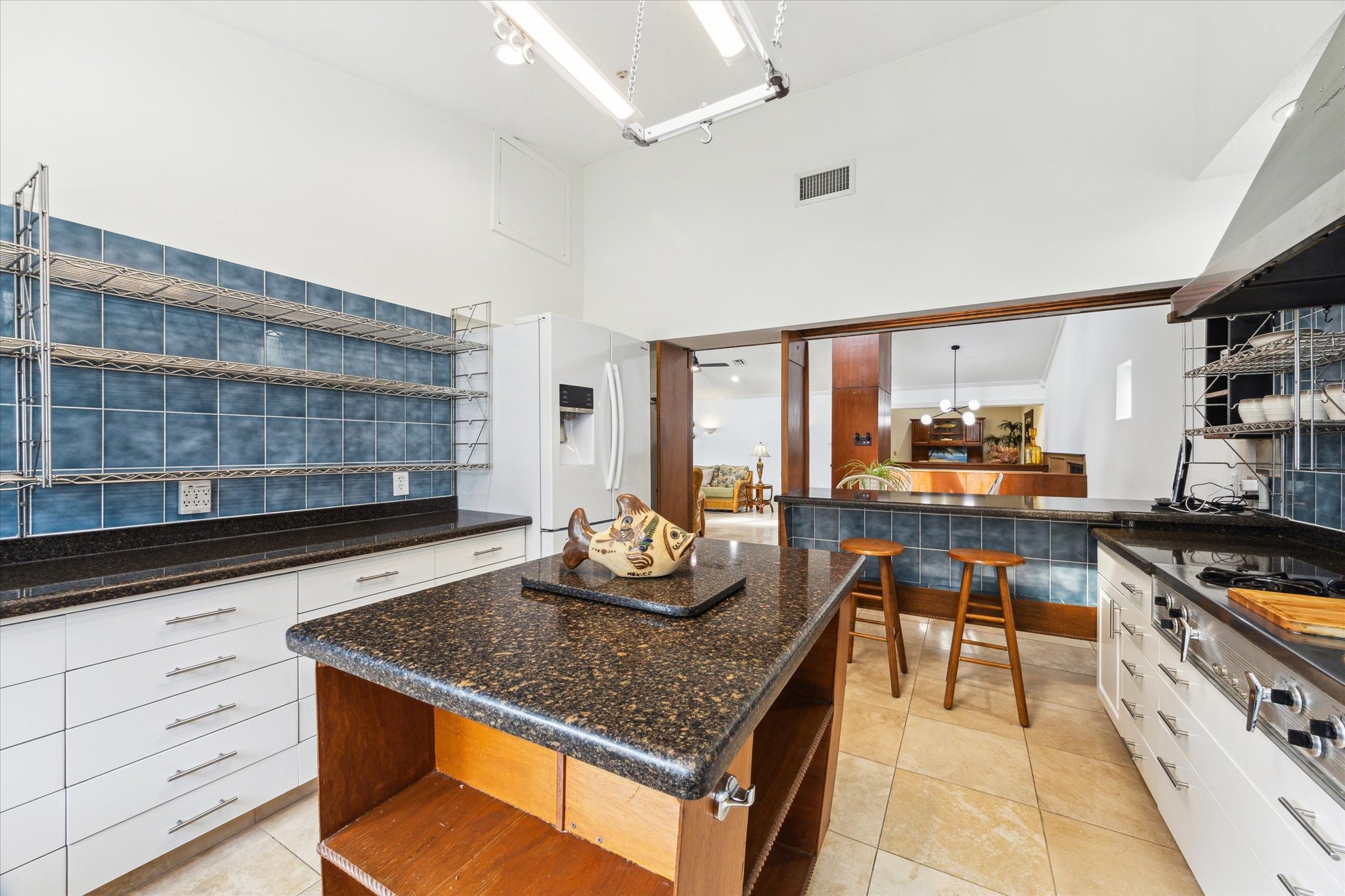 2414 Baycrest Drive Houston, TX 77058 - Photo 22 of 48 a kitchen with stainless steel appliances granite countertop a stove and a sink