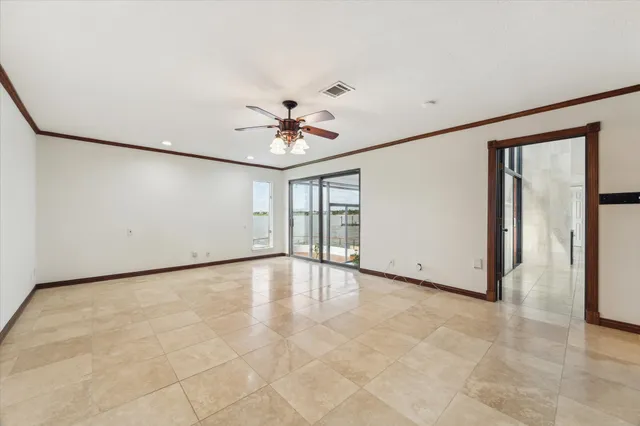 a bathroom with a sink double vanity granite tub shower and a mirror