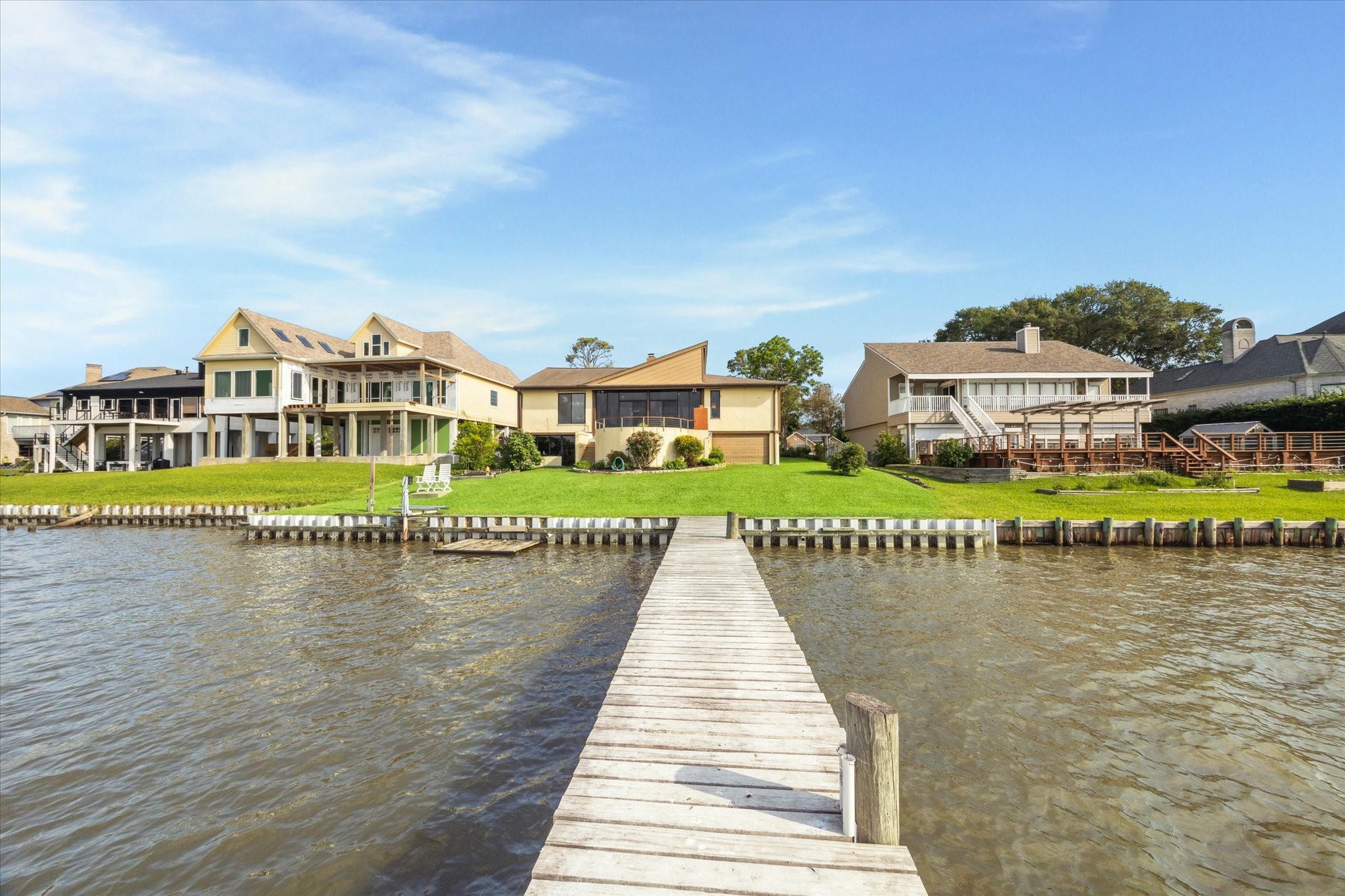 2414 Baycrest Drive Houston, TX 77058 - Photo 3 of 48 a view of swimming pool with outdoor seating and city view