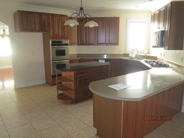 12680 Ashfield Road Caledonia, IL 61011 - Photo 8 of 24 a kitchen with a sink appliances and cabinets
