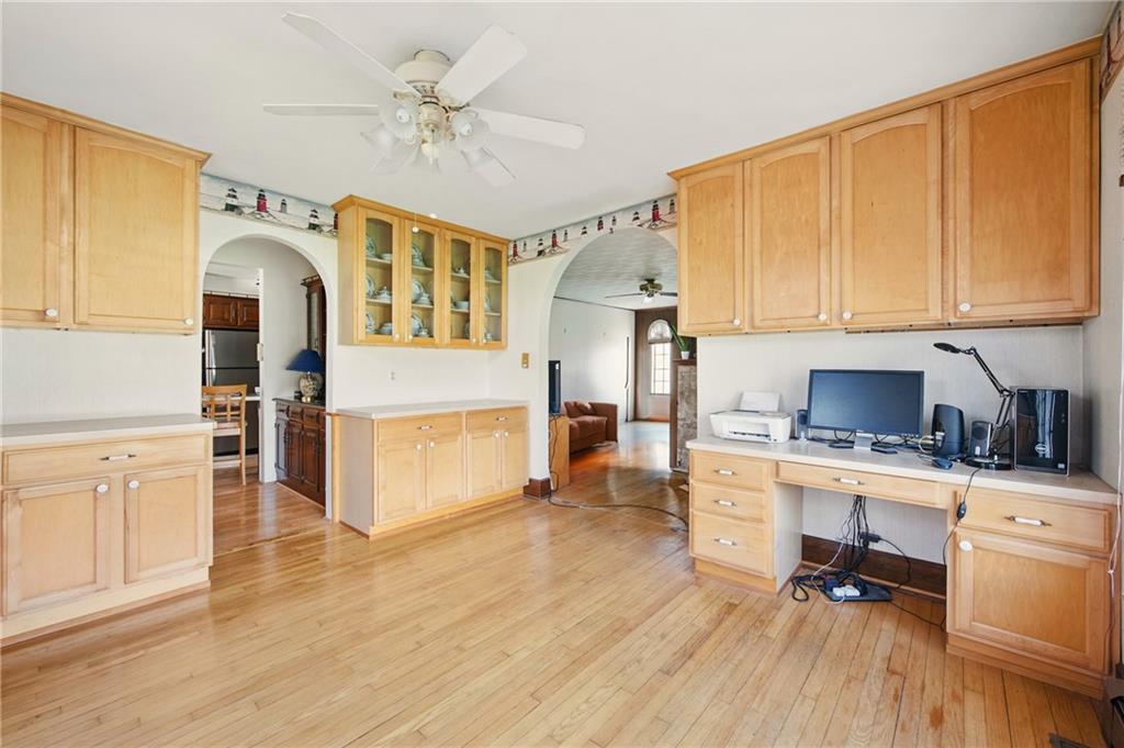 2341 South Hermitage Road Hermitage, PA 16148 - Photo 15 of 28 a kitchen with stainless steel appliances a stove a sink dishwasher and a refrigerator with wooden floor