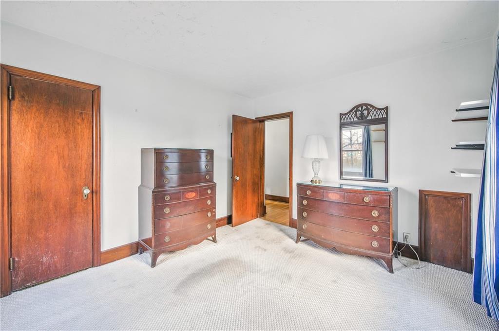 2341 South Hermitage Road Hermitage, PA 16148 - Photo 25 of 28 an empty room with closet and mirror
