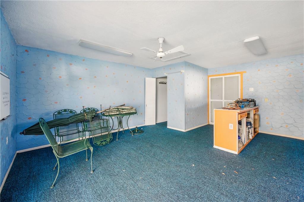 2341 South Hermitage Road Hermitage, PA 16148 - Photo 27 of 28 a living room with furniture and a kitchen area