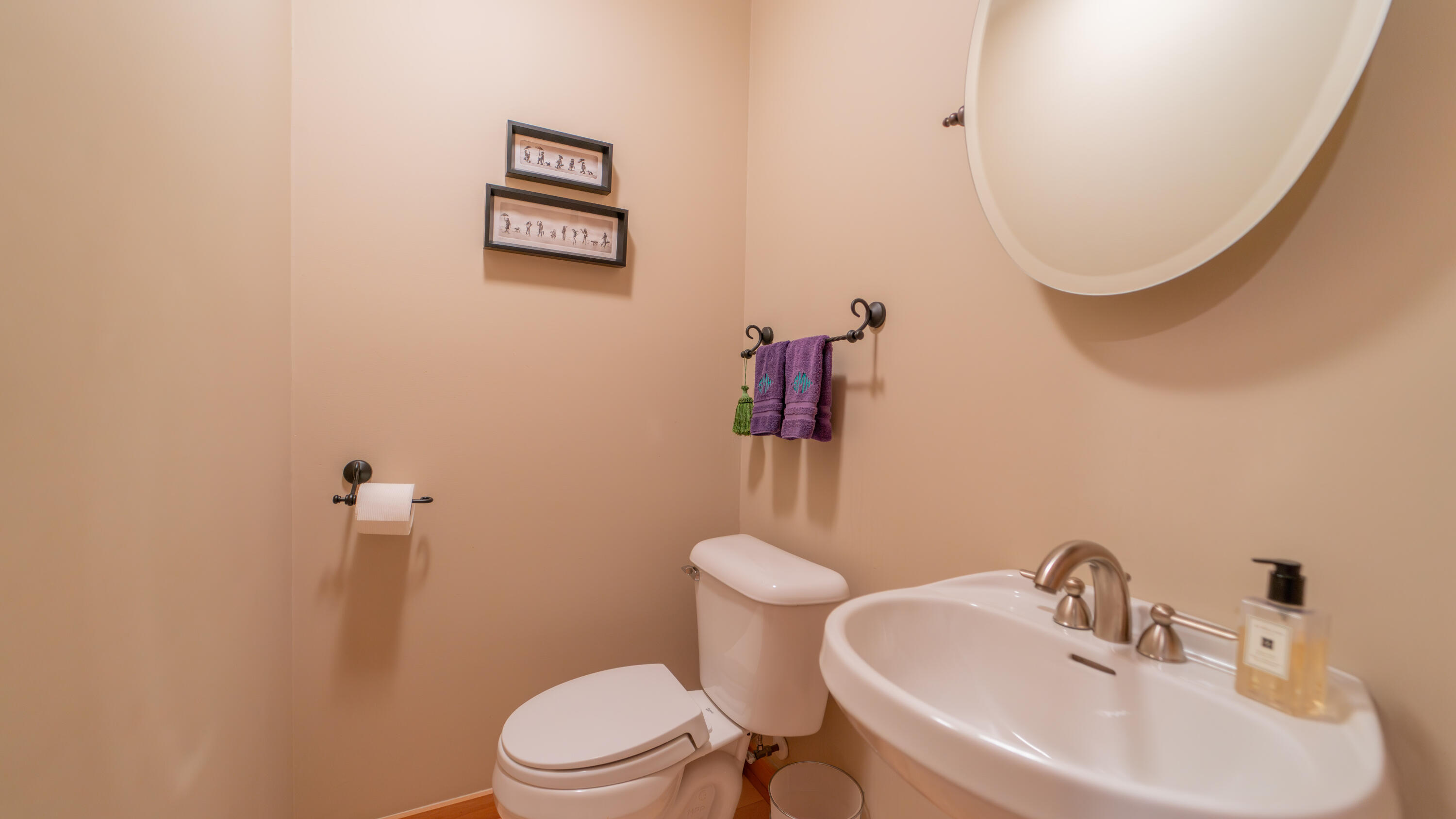 21 Turret Road Ogden Dunes, IN 46368 - Photo 18 of 32 a bathroom with a sink mirror and toilet