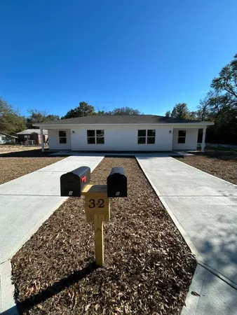 front view of house with a yard
