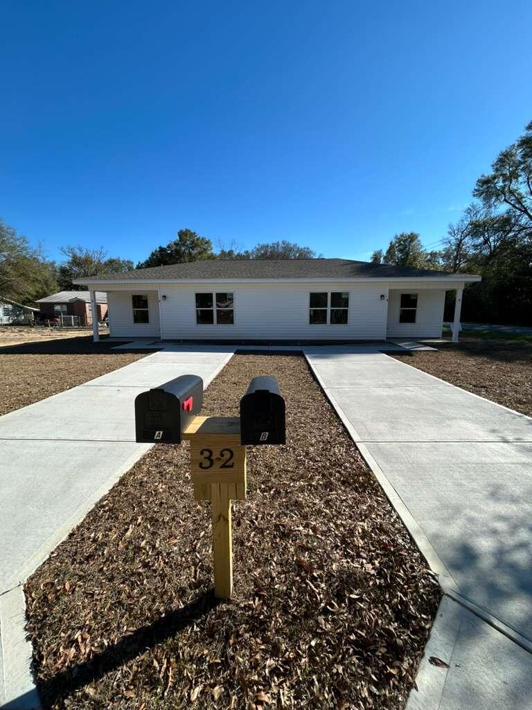 32 Constitution Avenue, Unit AB DeFuniak Springs, FL 32433 - Photo 2 of 12 IMG_5414