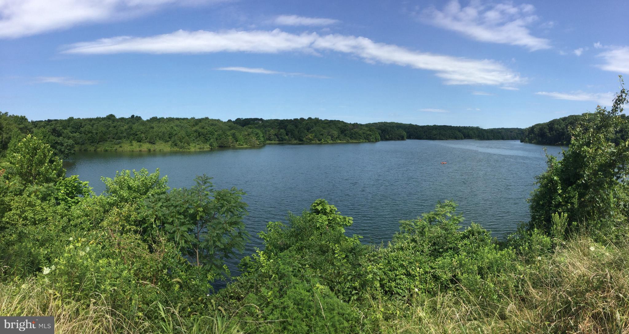20601 Top Ridge Drive Boyds, MD 20841 - Photo 25 of 26 a view of a lake with a city