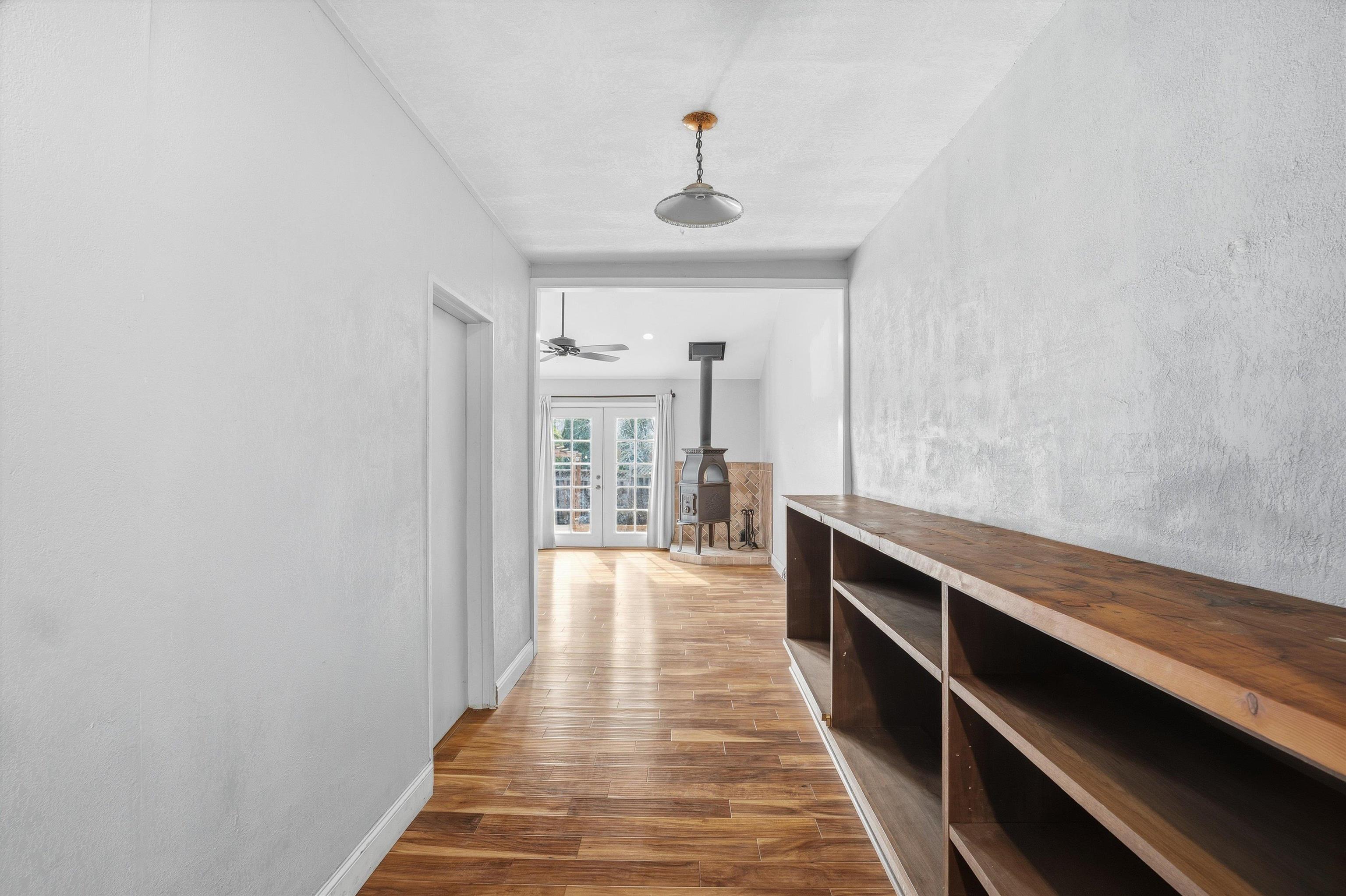 4054 Kimberly Place Concord, CA 94521 - Photo 12 of 16 Corridor with dark wood-style floors and a textured wall