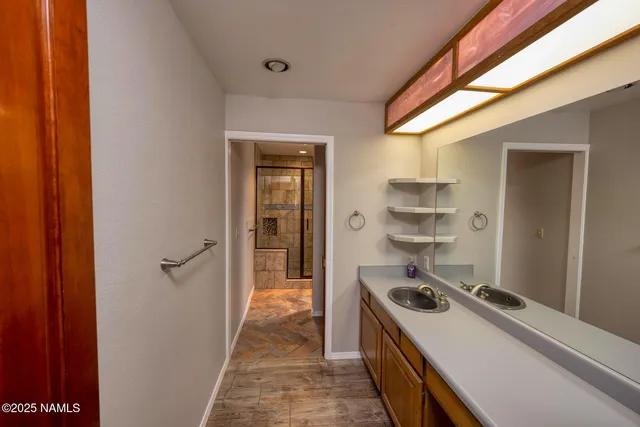 a kitchen with a stove and a refrigerator