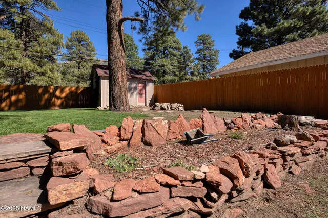 a view of a yard with an trees