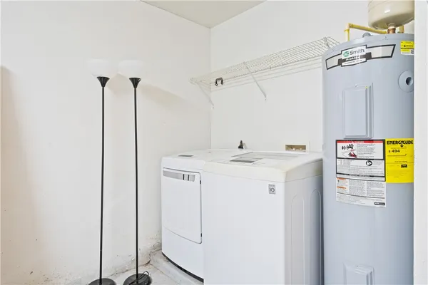 a view of a bathroom with tub
