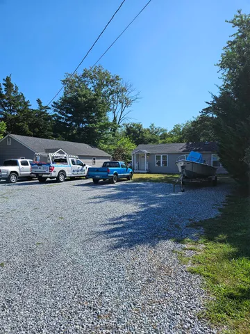 a view of street with parked cars