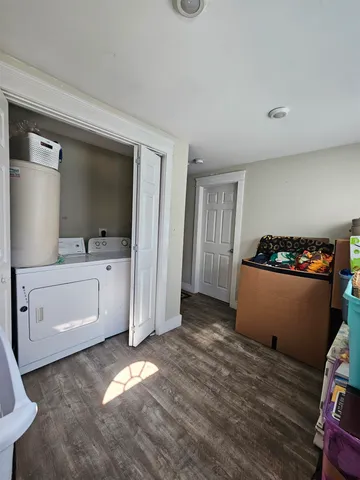 a kitchen with stainless steel appliances a sink stove and cabinets
