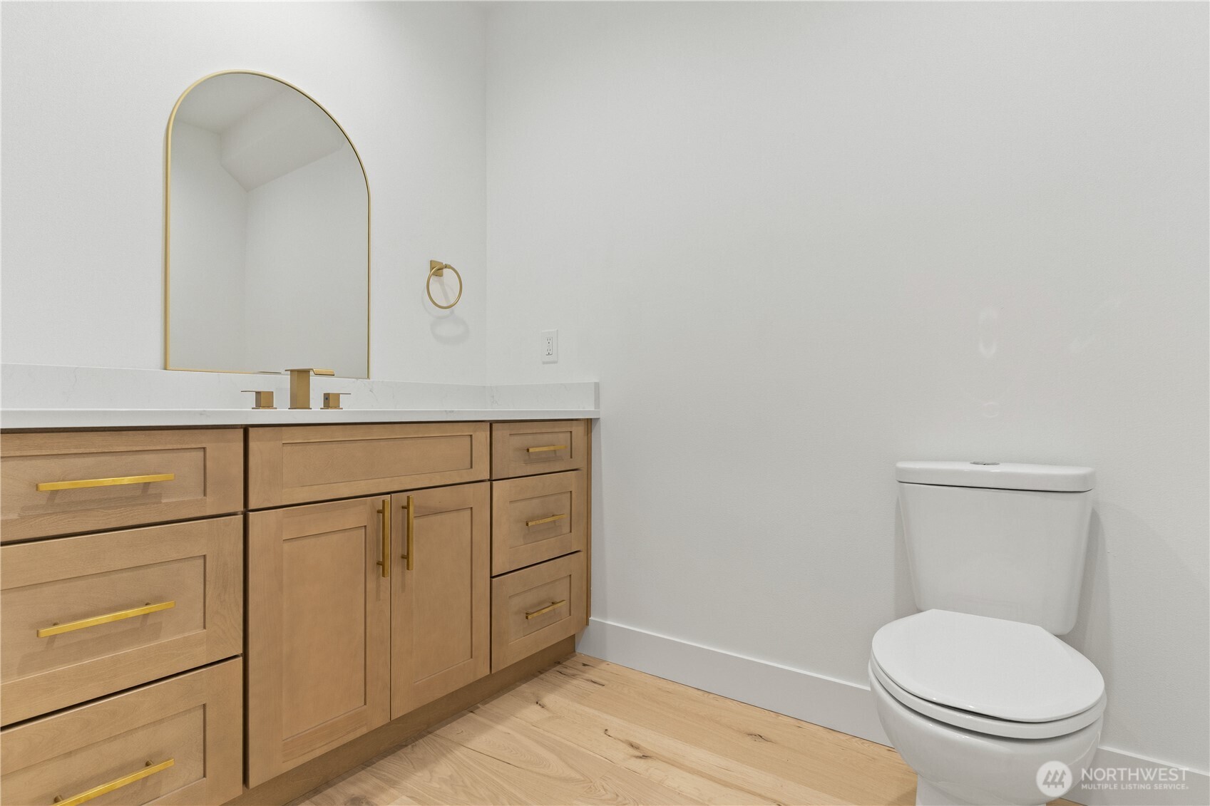 3 Acorn Place Bellingham, WA 98229 - Photo 13 of 35 a bathroom with a toilet a sink and mirror