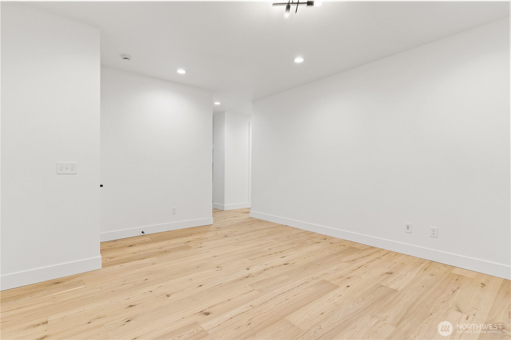 3 Acorn Place Bellingham, WA 98229 - Photo 26 of 35 an empty room with wooden floor and windows