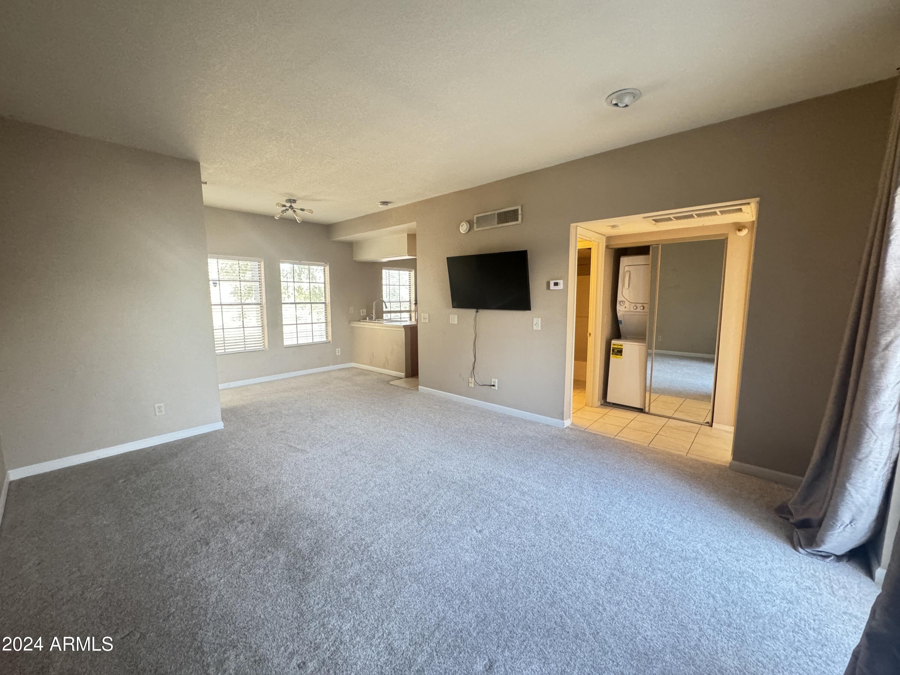 8020 East Thomas Road, Unit 226 Scottsdale, AZ 85251 - Photo 8 of 16 a view of livingroom with natural light