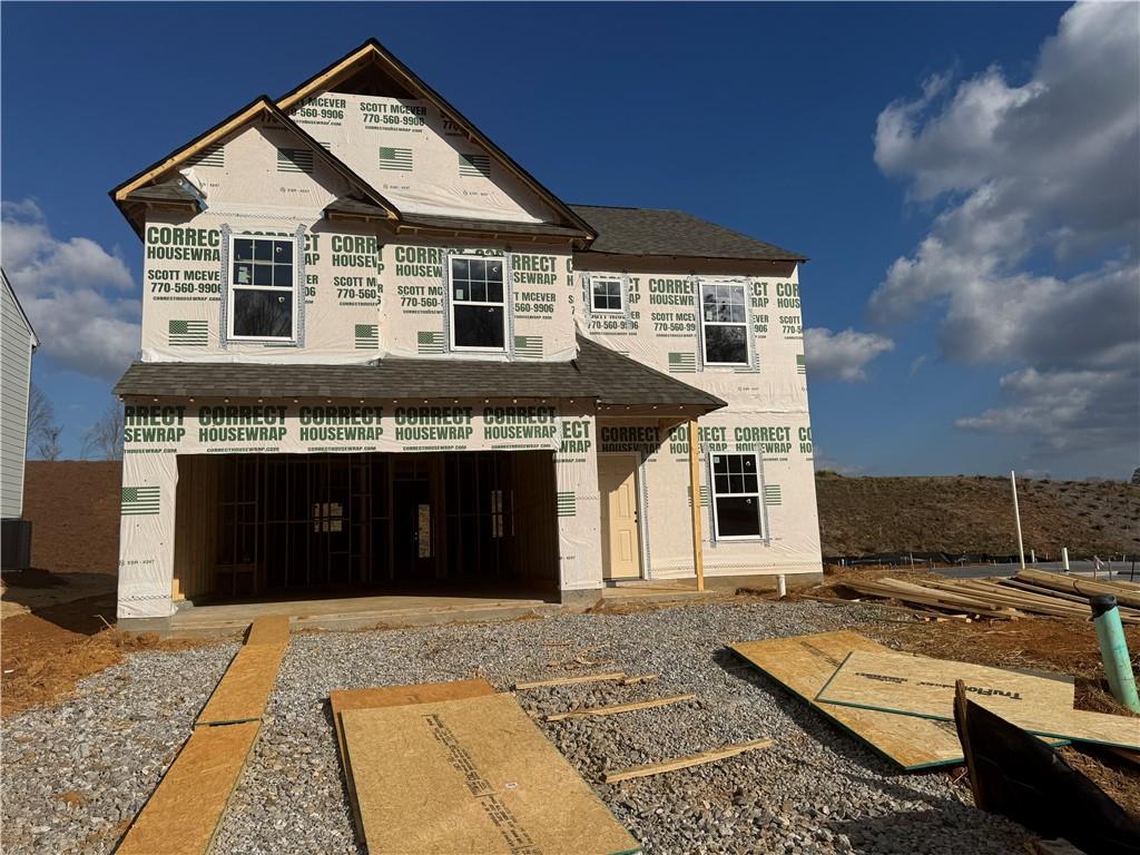 a front view of a house with yard