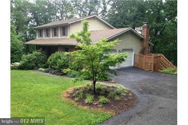 2667 Sandymount Road Finksburg, MD 21048 - Photo 2 of 30 a front view of house with a garden