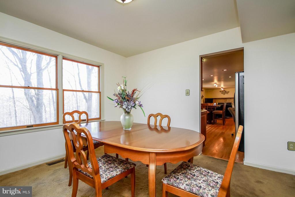 2667 Sandymount Road Finksburg, MD 21048 - Photo 13 of 30 a dining room with furniture and window