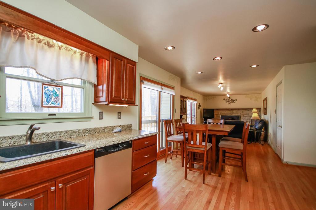 2667 Sandymount Road Finksburg, MD 21048 - Photo 17 of 30 a kitchen with lots of counter top space and dining table