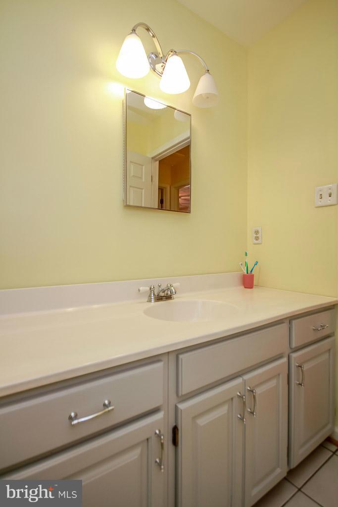 2667 Sandymount Road Finksburg, MD 21048 - Photo 27 of 30 a bathroom with a sink and a mirror
