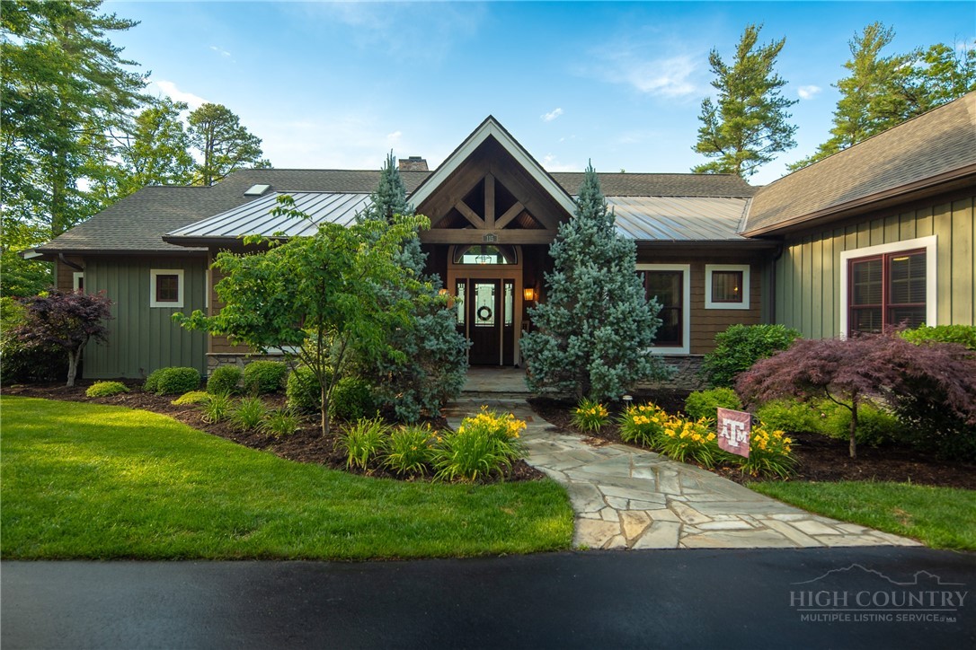 115 Passionflower Trail Boone, NC 28607 - Photo 36 of 50 a house with a garden