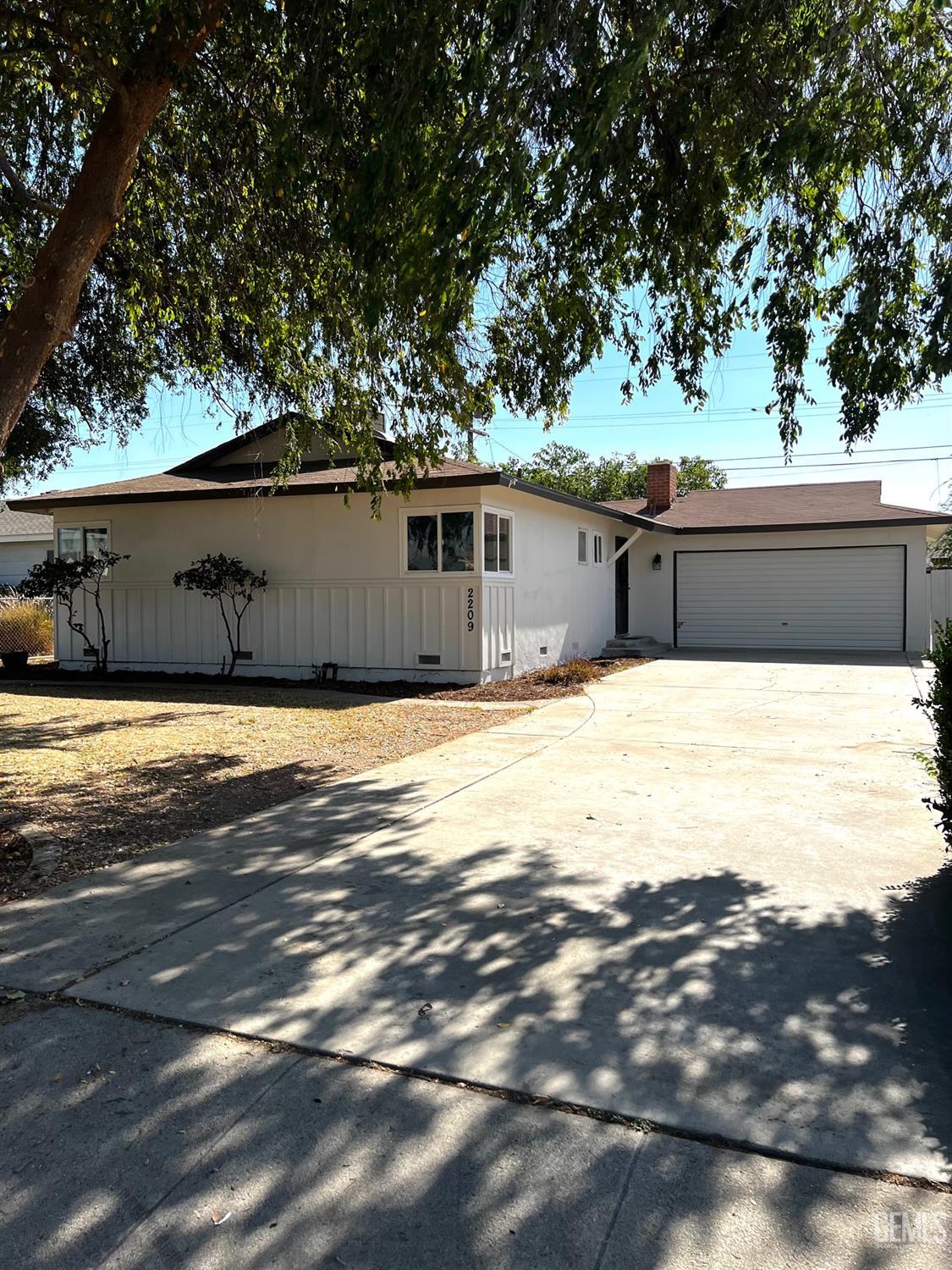 a view of a swimming pool with an outdoor space