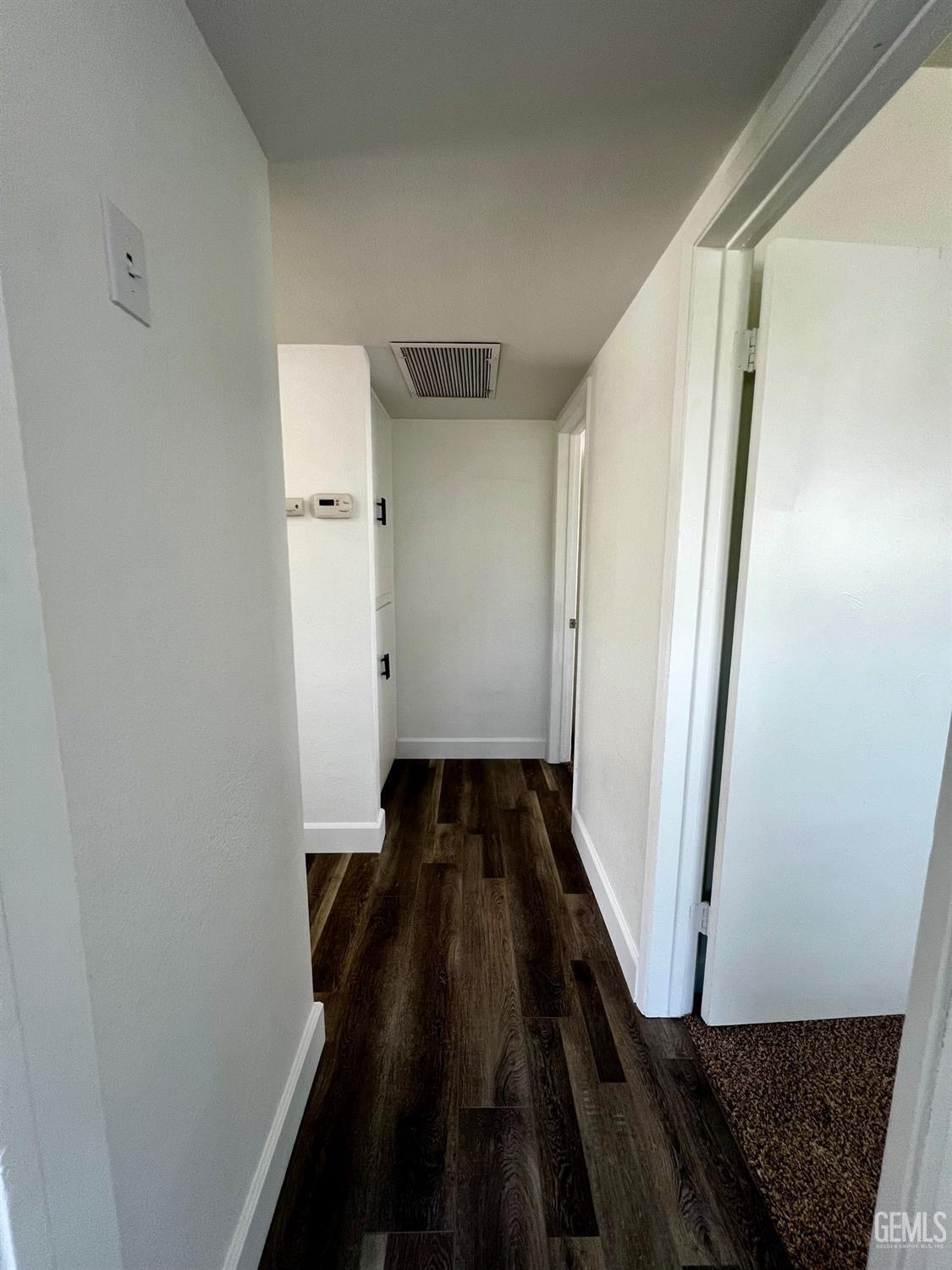 Undisclosed Address Bakersfield, CA 93304 - Photo 13 of 20 a view of a hallway