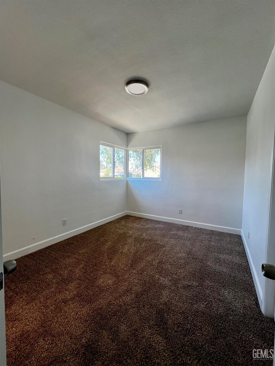Undisclosed Address Bakersfield, CA 93304 - Photo 15 of 20 an empty room that has a window