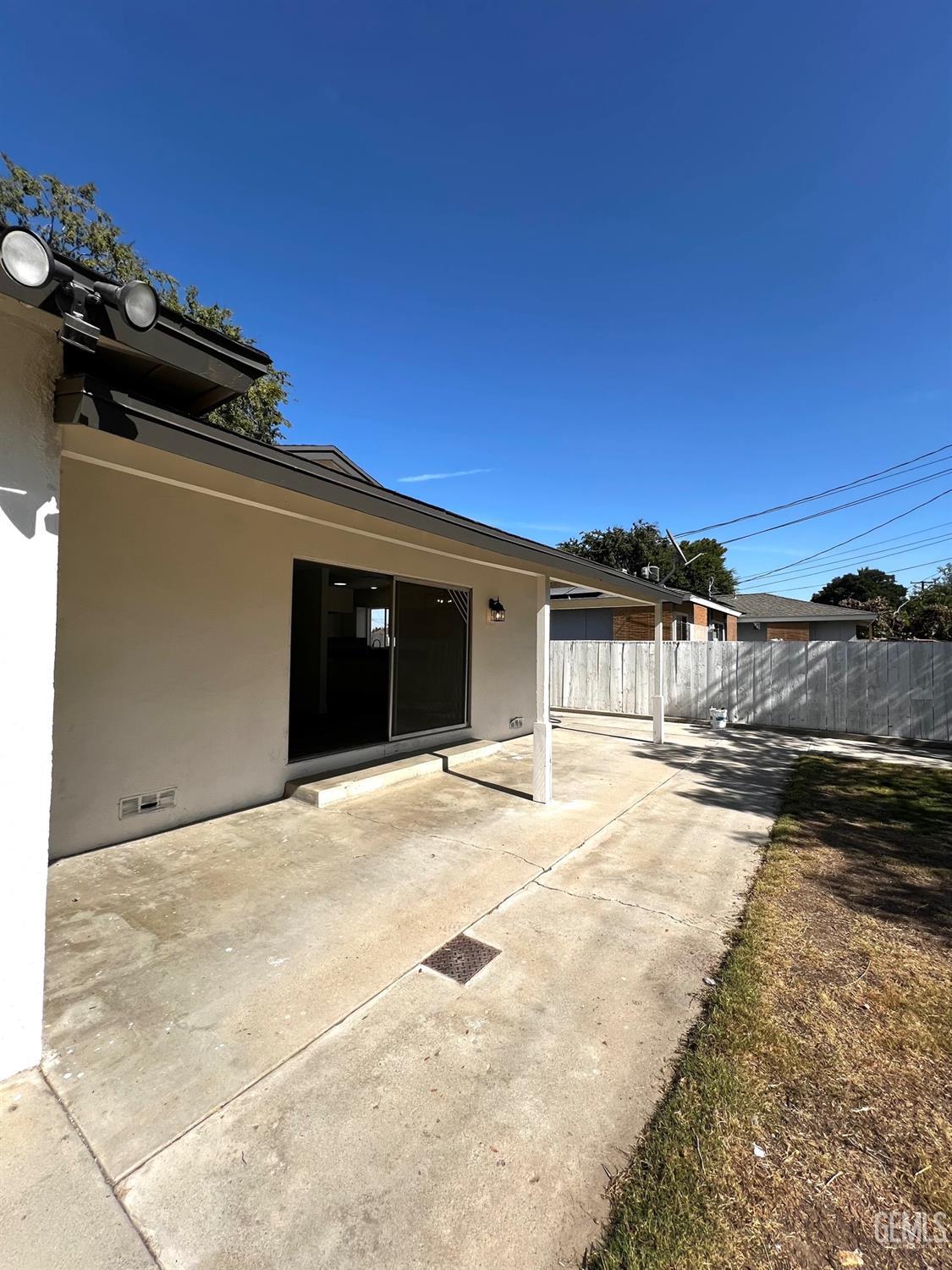 Undisclosed Address Bakersfield, CA 93304 - Photo 18 of 20 a view of a house with a snow in the yard