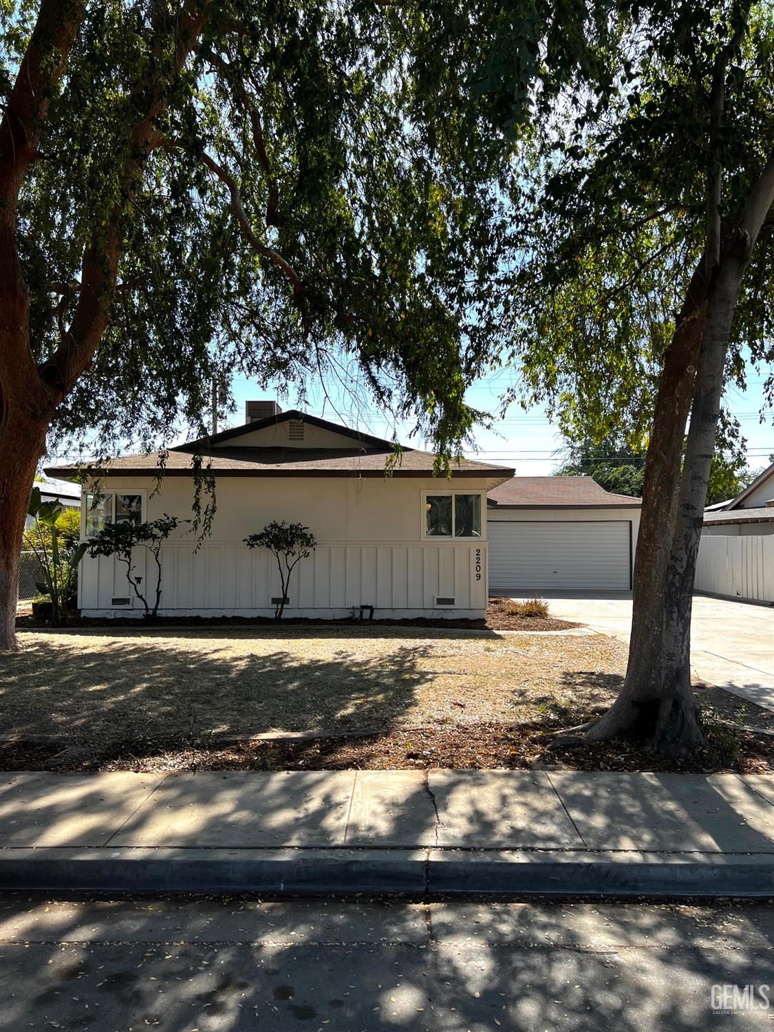 Undisclosed Address Bakersfield, CA 93304 - Photo 2 of 20 a view of back yard of the house