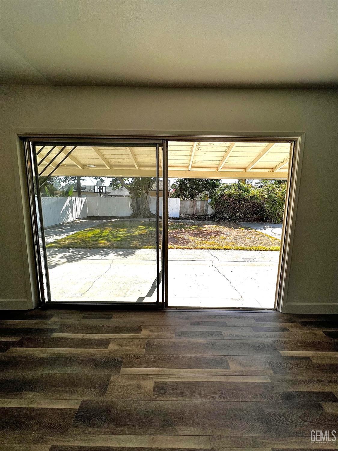Undisclosed Address Bakersfield, CA 93304 - Photo 5 of 20 a view of a room with wooden floor