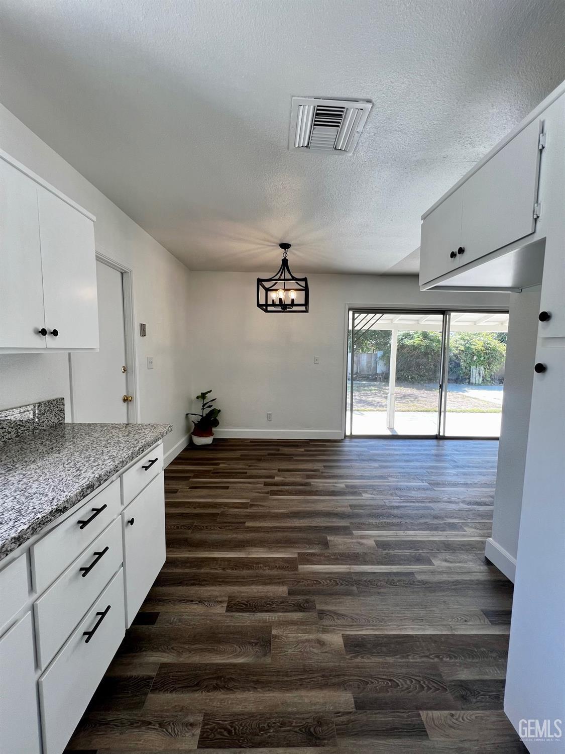 Undisclosed Address Bakersfield, CA 93304 - Photo 8 of 20 a bathroom with a sink and a window