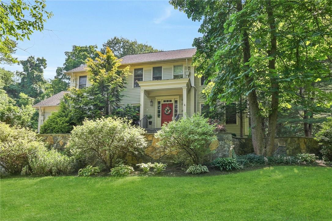 9 Mountain View Road Patterson, NY 12563 - Photo 1 of 1 View of the front of the residence with lush landscaping and specimen plantings