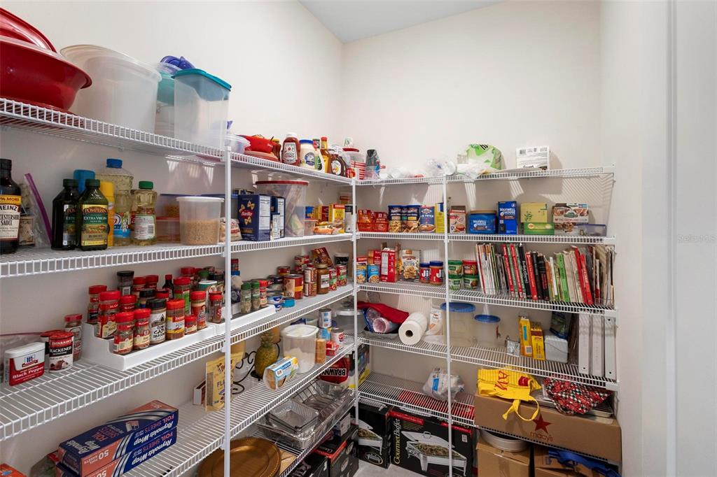 8953 Southwest 50th Terrace Ocala, FL 34476 - Photo 18 of 49 a room with books and a book shelf