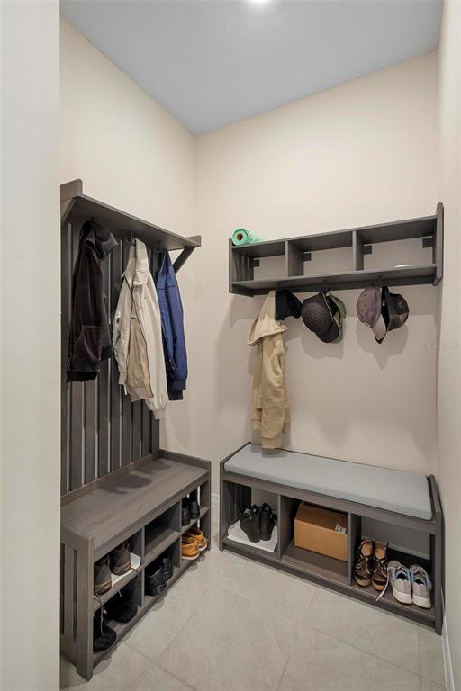 8953 Southwest 50th Terrace Ocala, FL 34476 - Photo 20 of 49 a view of walk in closet with clothes and shoes