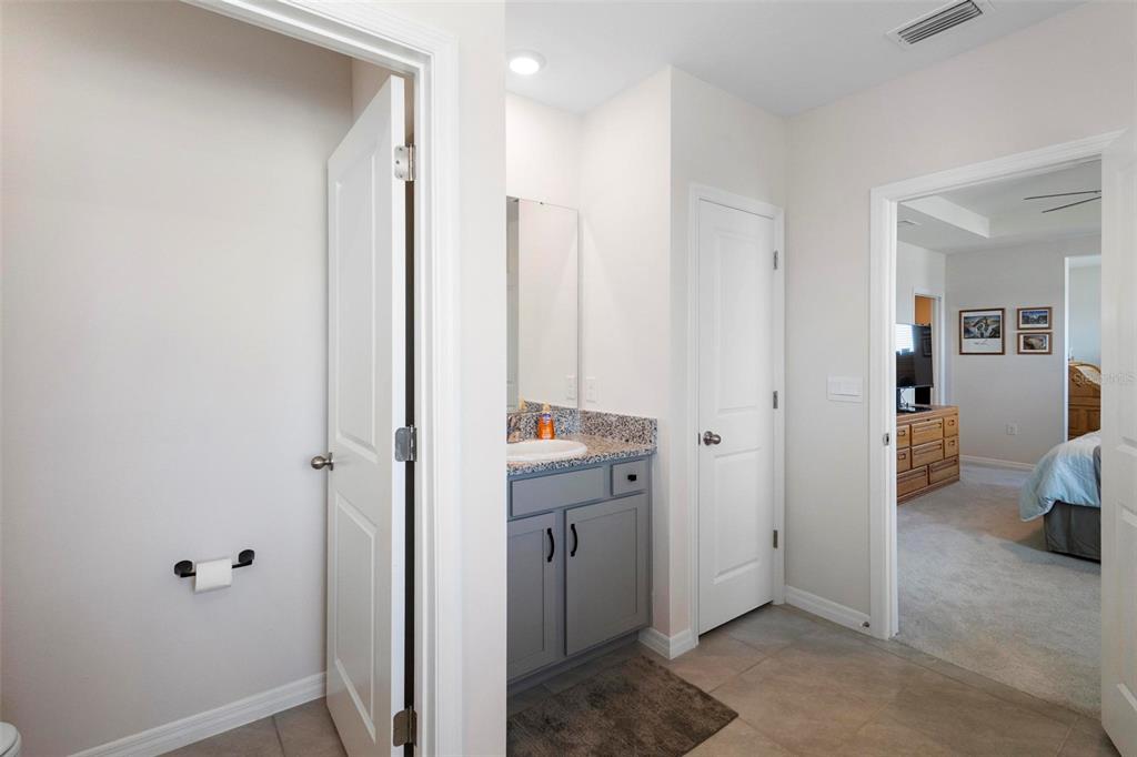 8953 Southwest 50th Terrace Ocala, FL 34476 - Photo 34 of 49 a view of a hallway with bathroom