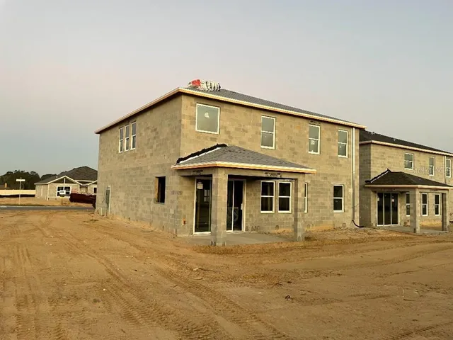 a front view of a house with parking