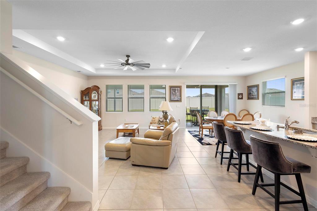 8953 Southwest 50th Terrace Ocala, FL 34476 - Photo 10 of 49 a living room with furniture two window and a table