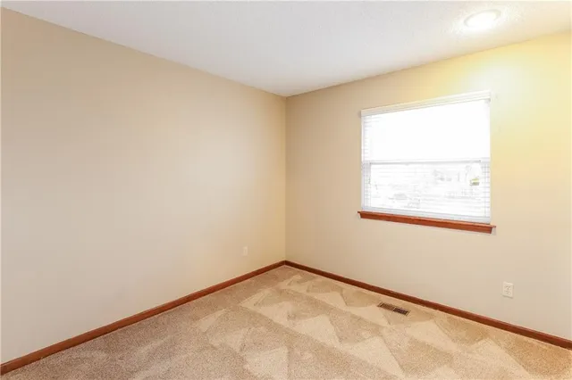 $1,835 | 14604 St Andrews Drive, Grandview, MO 64030